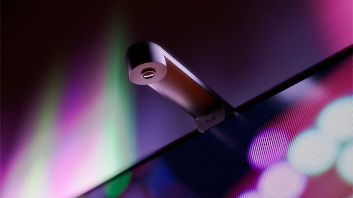 Philips Hue smart lighting products including gradient strip light and pendant in a living room setup
