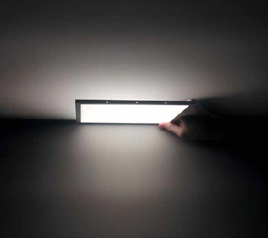 Light Guide Technology for Obtaining a Different Bi-Directional Direct/Indirect Light Emission Pattern